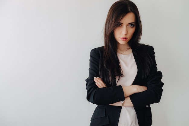 Free Photo young attractive emotional girl in business-style clothes