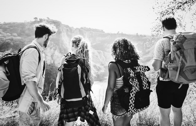 Free Photo young backpackers traveling in nature