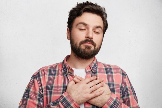 Young bearded man with striped shirt