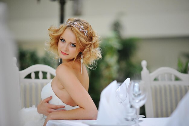 Young beautiful blonde model bride