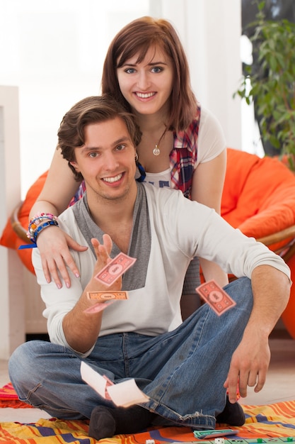 Young beautiful couple at home