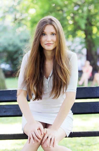 Free photo young and beautiful girl in park