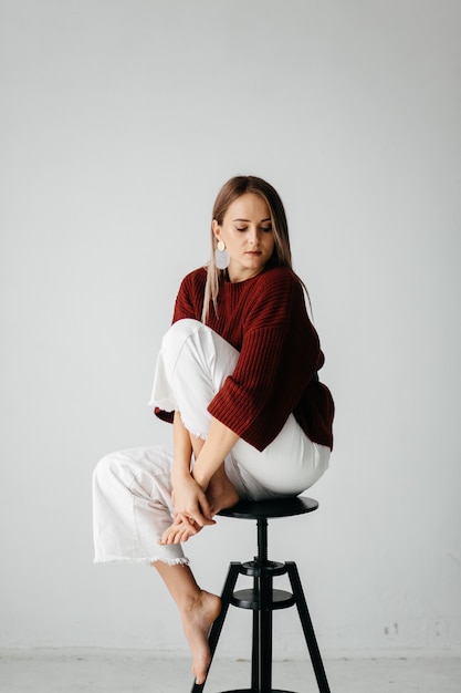 young beautiful girl in studio, fashion portrait