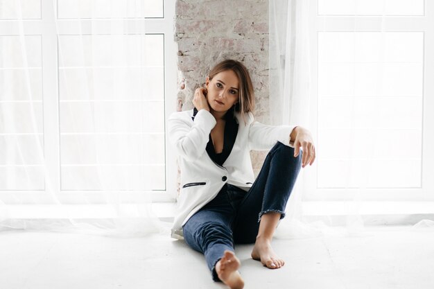 young beautiful girl in studio, fashion portrait