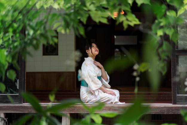 Young beautiful japanese woman wearing a traditional kimono