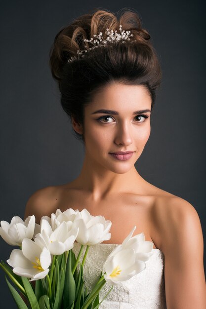 Young beautiful stylish woman in wedding dress