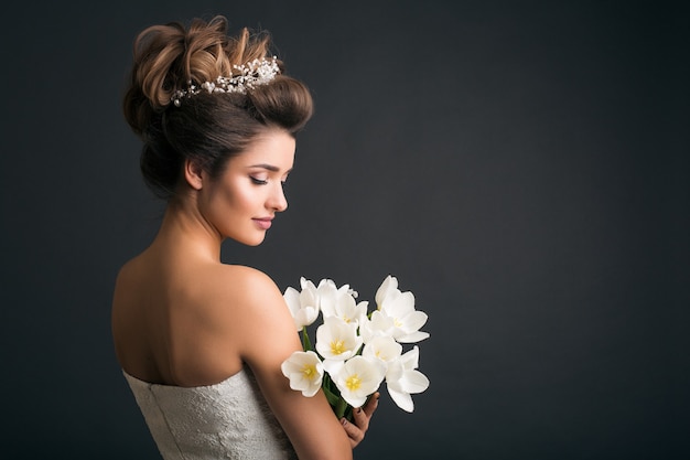 Young beautiful stylish woman in wedding dress