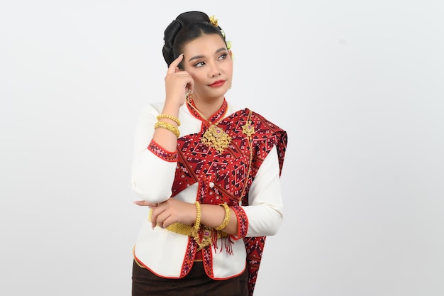 Young beautiful woman in a costume of the northeastern region thoughful posture