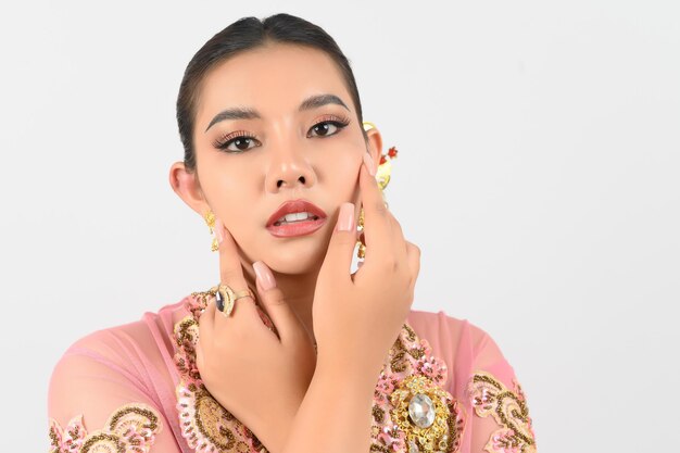 Young beautiful woman dress up in local culture in southern region with beauty posture