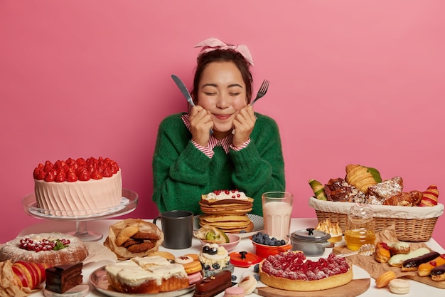 Young beautiful woman enjoying a wholesome dinner