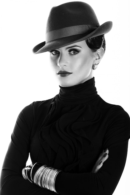 Young and beautiful woman in hat