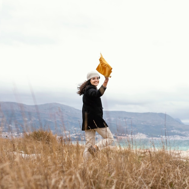 Free Photo young beautiful woman in nature