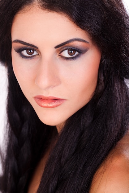 Free photo young and beautiful woman with bright make up