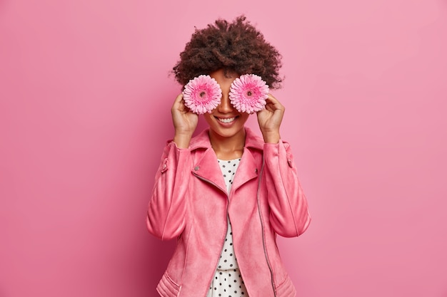 Free photo young beautiful woman with curly hair isolated