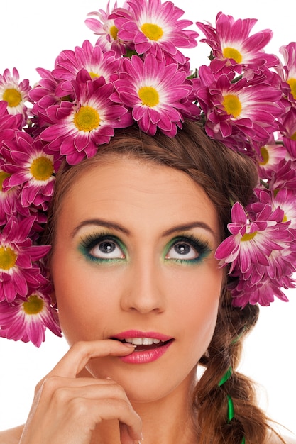 Free Photo young beautiful woman with flowers in hair