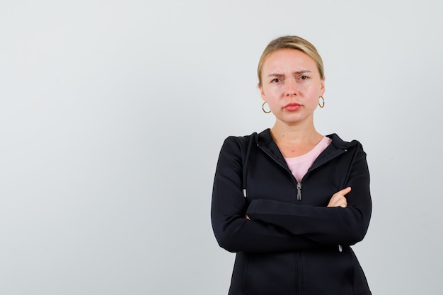 Free Photo young blonde woman in a black jacket