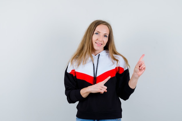 Young blonde woman in a jacket and jeans