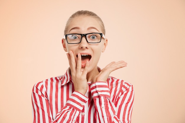 Free Photo young blonde woman wearing striped shirt