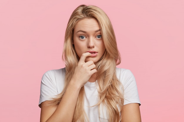 Young blonde woman with white T-shirt