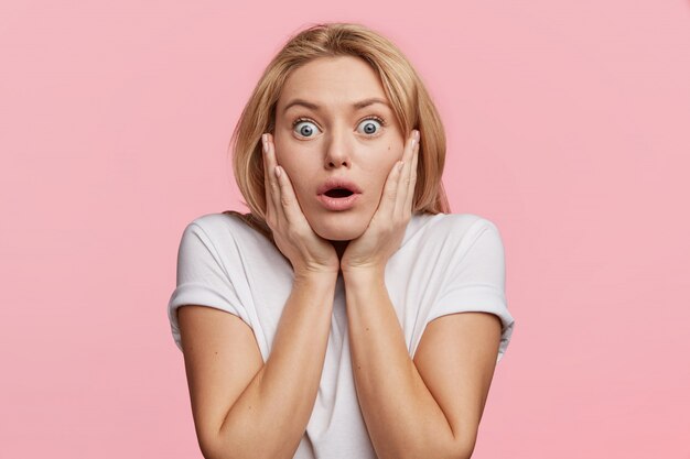 Young blonde woman with white T-shirt