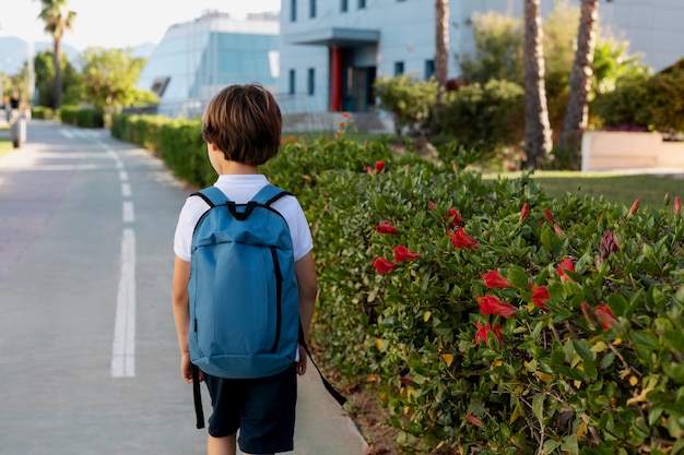 Free Photo young boy getting back to school