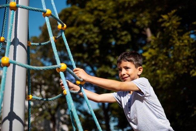 Young boy having fun in the playground