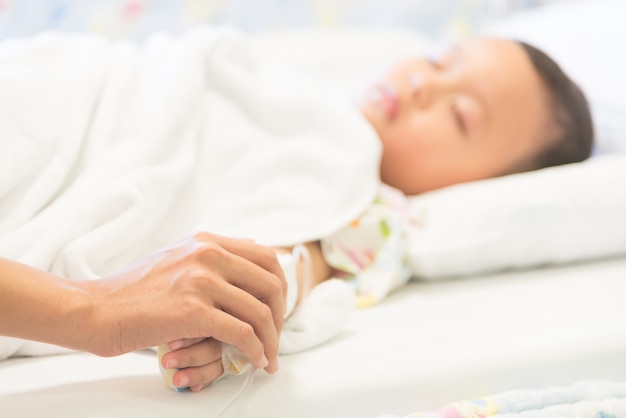 Young boy sleep and sickness stay in hospital