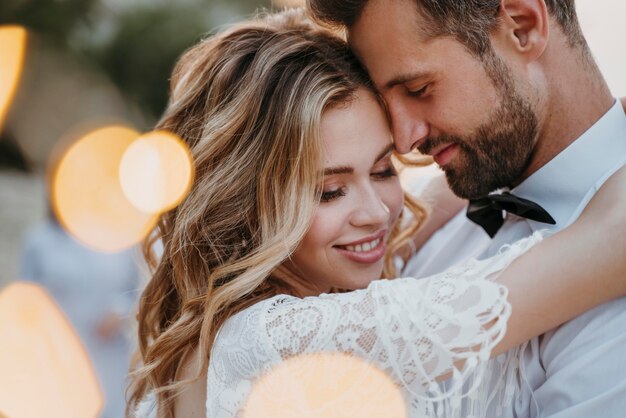 Young bride and groom having a beach wedding