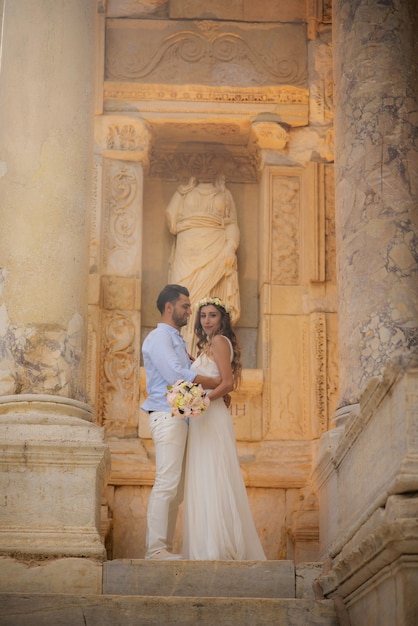 Young bride and groom in wedding dress, and causal wedding