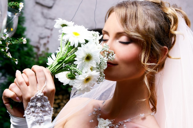 Young bride with flowers