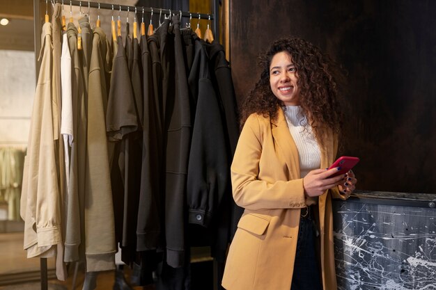 Young business owner preparing her store