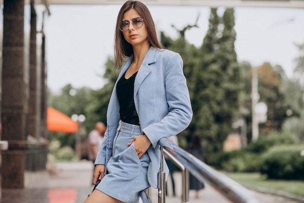 Free Photo young business woman dressed in blue suit