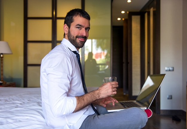 Free photo young businessman worning in hotel