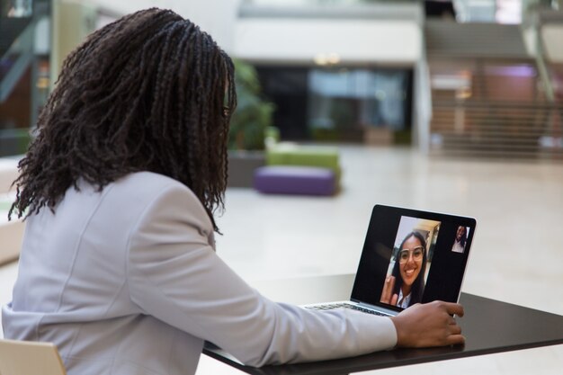 Young businesswoman using laptop