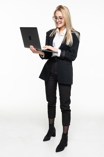 Young businesswoman with laptop, isolated