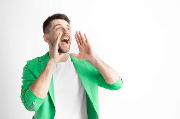 Free photo young casual man shouting