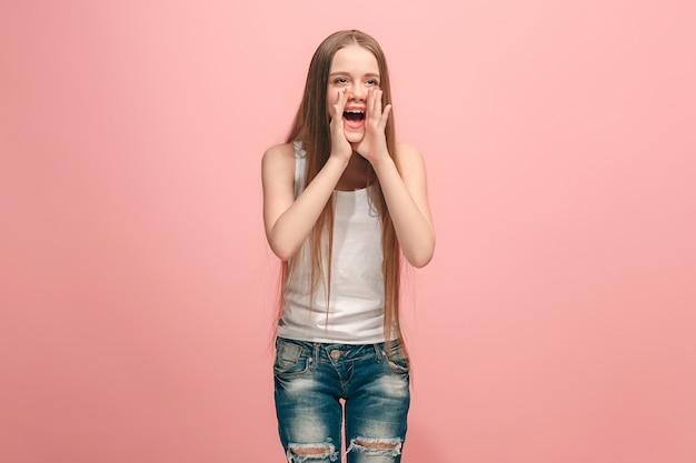 young casual teen girl shouting at studio