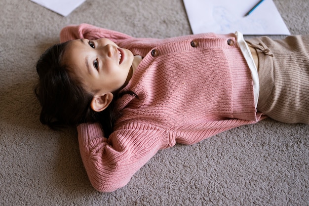 Free Photo young child spending time together in the comfort of their home