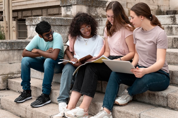 Young colleagues studying together for a college exam