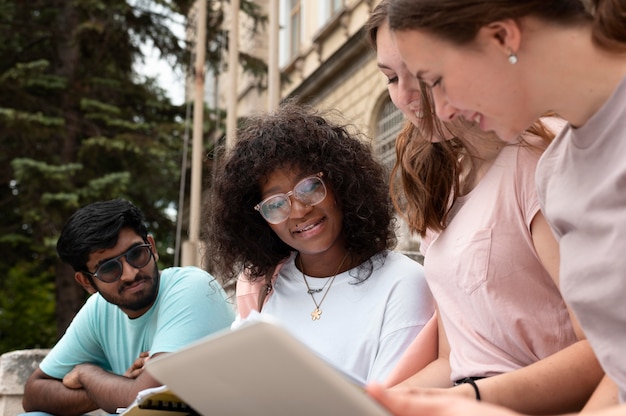 Young colleagues studying together for a college exam