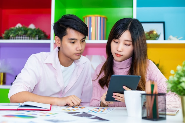 Young colleagues working together at modern office