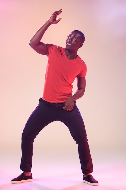 Free photo young cool black man dancing