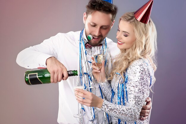 Young couple celebrating New Years Eve