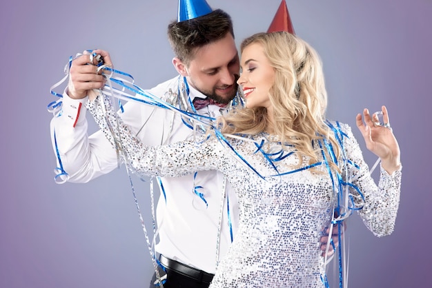 Young couple celebrating New Years Eve