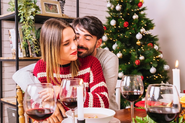 Young couple at christmas dinner