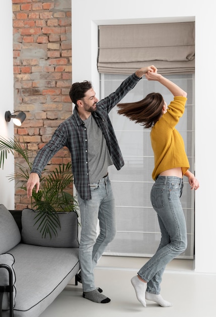 Free photo young couple dancing