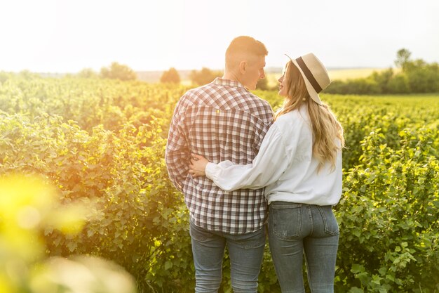 Young couple at farm walking