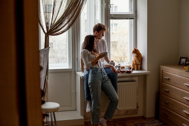 Young couple having breakfast