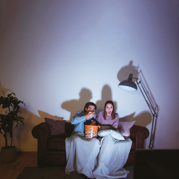 Young couple having a movie night