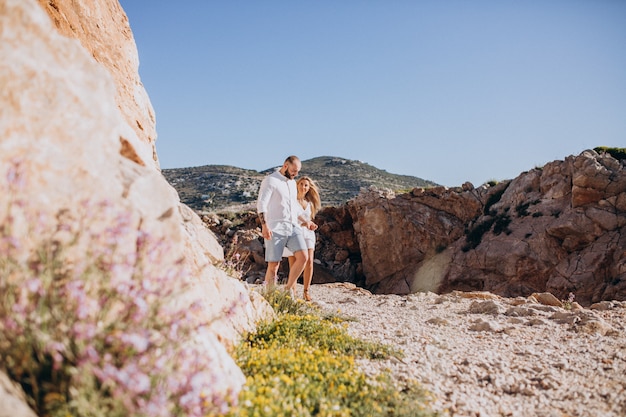 Young couple on honeymoon in Greece by the sea